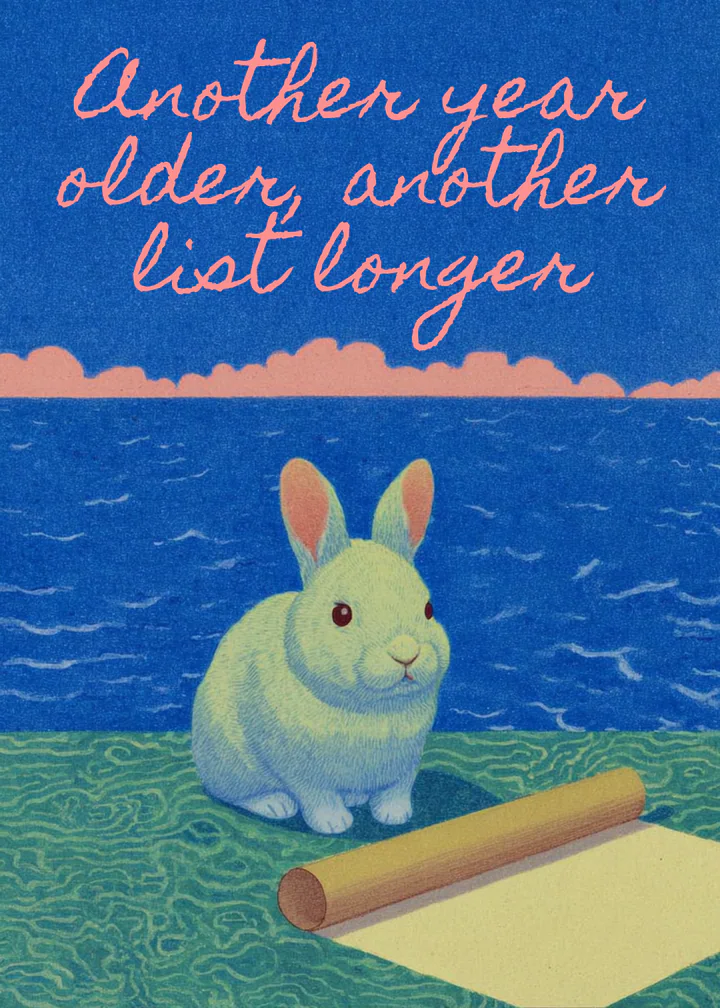 A blue illustrated anniversary card with a rabbit